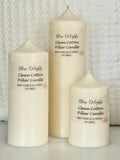 Three cream-coloured Bliss Delights Clean Cotton soy wax pillar candles in small, medium and large sizes, arranged against a white textured quilted background.